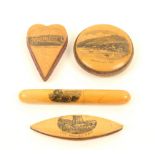 Four pieces of Mauchline ware, comprising; a tatting shuttle (Laxey Wheel, Isle of Man), 7.5cm, a