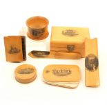 Seven pieces of Mauchline ware, comprising; a swivel notelet (Carnarvon Castle), 7.5cm, a