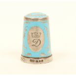 An English silver and blue enamel thimble commemorating Princess Diana, 1961-1997, by A.G.