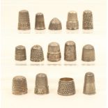 Fourteen reproduction English silver thimbles, including copies of early thimbles, commemoratives