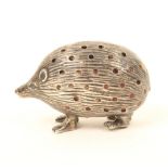 A silver pincushion in the form of a hedgehog, Birmingham, 1905, by A. and L L.,  4.5cm