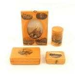 Four pieces of Mauchline ware, comprising; a rectangular photograph frame with oval aperture (