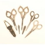 Four pairs of silver handled scissors and three scissor sheaths, the scissors Birmingham 1902, 10.