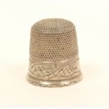 An unusual large silver thimble, by Charles Horner, probably a sample, wriggle engraved border, over