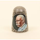 An English silver and enamel thimble, by Peter Swingler, depicting an oval portrait of Sir Edward