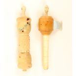 Two bone and vegetable ivory tape measure/needlecases, one with replacement tape and Stanhope (