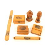 Seven pieces of Mauchline ware, comprising; an alternate woods cylinder box (Peterborough