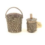 A silver tape measure and basket pincushion, by Joseph Taylor of Birmingham, circa 1820, the tape