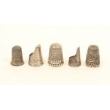 Five English silver thimbles, comprising; an example with double dot rim, makers mark 'HW',