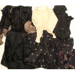 A group of mainly late 19th century black lady's wear, including an appliqued net bodice and skirt