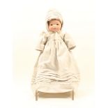 An Armand Marseille bisque head doll, impressed 'A.M. Germany 341-OK', closing eyes, closed mouth,