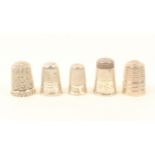 Five English silver thimbles, comprising; a Queen Victoria commemorative with crown and 'Queen