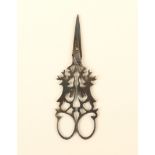 A pair of steel scissors, 18th/19th century, the arms in the form of standing stags to shaped loops,