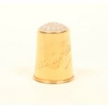 A gold thimble in the Danish/Norwegian style, moonstone top, engraved 'Olleaf Herman', marked