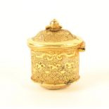 A late 18th century gilt metal thimble case and thimble for a chatelaine, the oval section case with