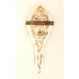 A 19th century Meissen style porcelain scissor case, with raised gilt scroll motifs and decorated