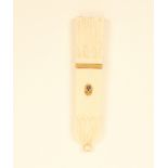 A Palais Royal ivory needlecase in the form of a quiver of arrows, with gilt oval pansy motif and
