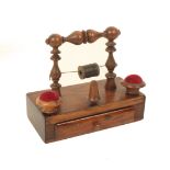 A Regency rosewood reel stand/companion, the rectangular base fitted with a drawer below twin vase