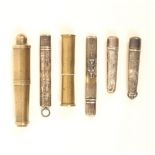 Six metal needlecases and other items, comprising; a brass example in the form of a cannon barrel,