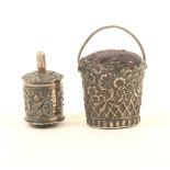 A silver pincushion and tape measure, by Joseph Taylor, Birmingham, the oval section pincushion with