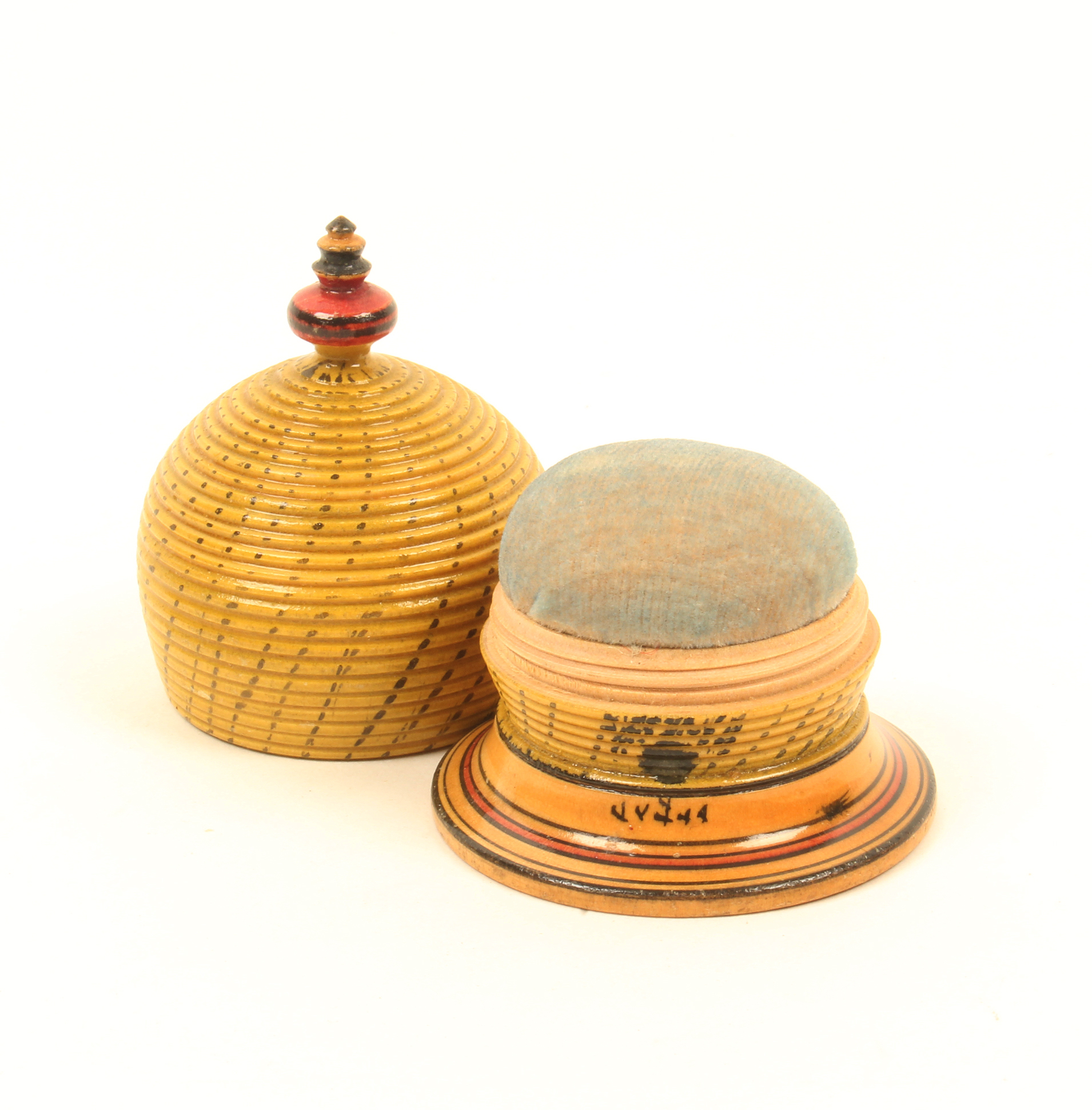 A good early painted Tunbridge ware pin poppet, in the form of a bee skep, in near mint condition,