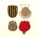 Four 19th century lady's purses, all with polished steel clasps, three with cut steel beaded