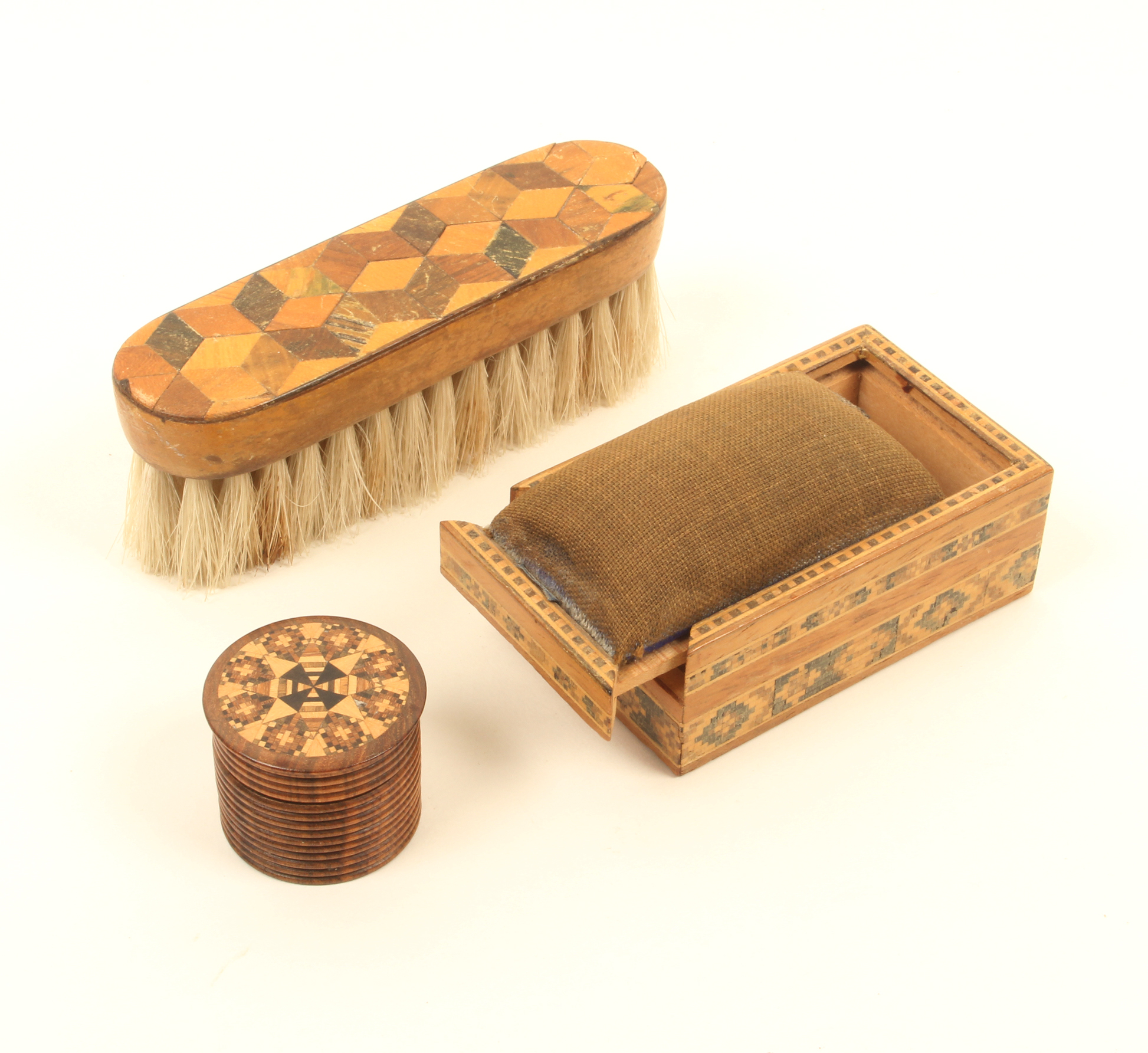 Three pieces of Tunbridge ware, comprising; a pincushion box, the sliding lid over sides with two