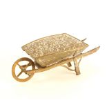 A gilt brass Avery needlepacket case, 'Wheelbarrow with Roses', stamped 'No. 602, W. Avery and