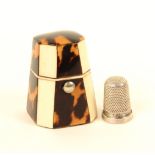 An unusual ivory and tortoiseshell thimble case of octagonal tapering form, below a domed top,