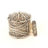 A late 18th century English silver filigree cased tape measure, flowerhead base, quill work sides,