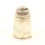 An 18th or early 19th century tall silver thimble, the plain deep frieze initialled and dated 'J.