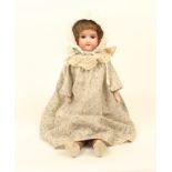 An Armand Marseille bisque head doll, impressed '370 A.M. 4/)X DE ˜', closing eyes, open mouth