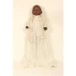 An Armand Marseille bisque dream baby black headed doll, impressed 'A.M.-Germany 351 8K', closing