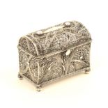 A 19th century silver filigree casket, probably Portuguese, quill work panels, domed hinged top,