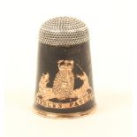A rare Piercy's Patent thimble, the body in tortoiseshell over a gilt rim with inset Royal coat of