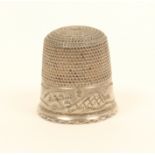 An unusual large silver thimble, by Charles Horner, probably a sample, wriggle engraved border, over