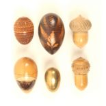 Six thimble cases, comprising; two vegetable ivory examples, one with thimble, reel and