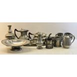 A 20th Century hammered pewter four piece Teaset by G L & Co., various other hammered pewter
