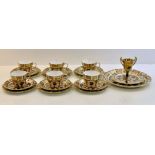A Royal Crown Derby Imari pattern Teaset comprising six cups, six saucers, seven plates and a