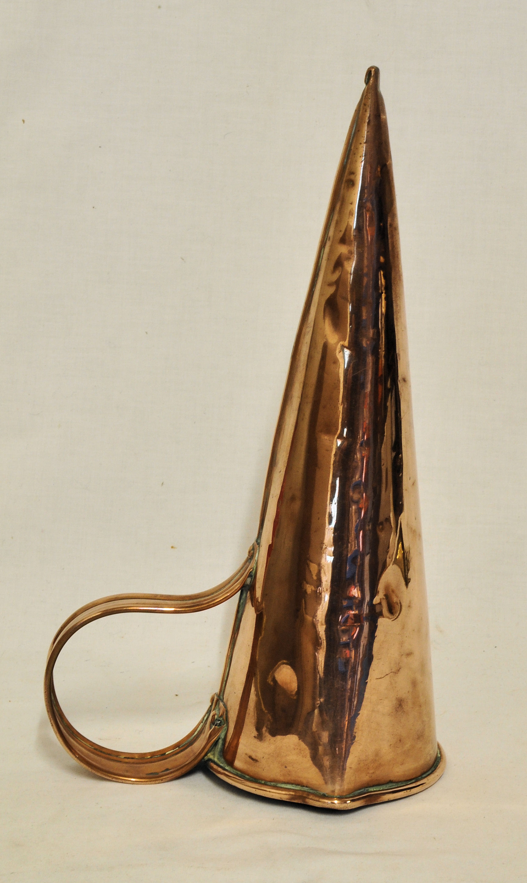 A 19th Century copper Ale Muller with loop handle.