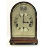 A Mantel Clock with engraved steel dial with rod strike in a domed mahogany case on ball feet,