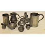 A Victorian pewter Quart Mug, another pewter Mug by James Dixon, a pewter Candlestick, and other