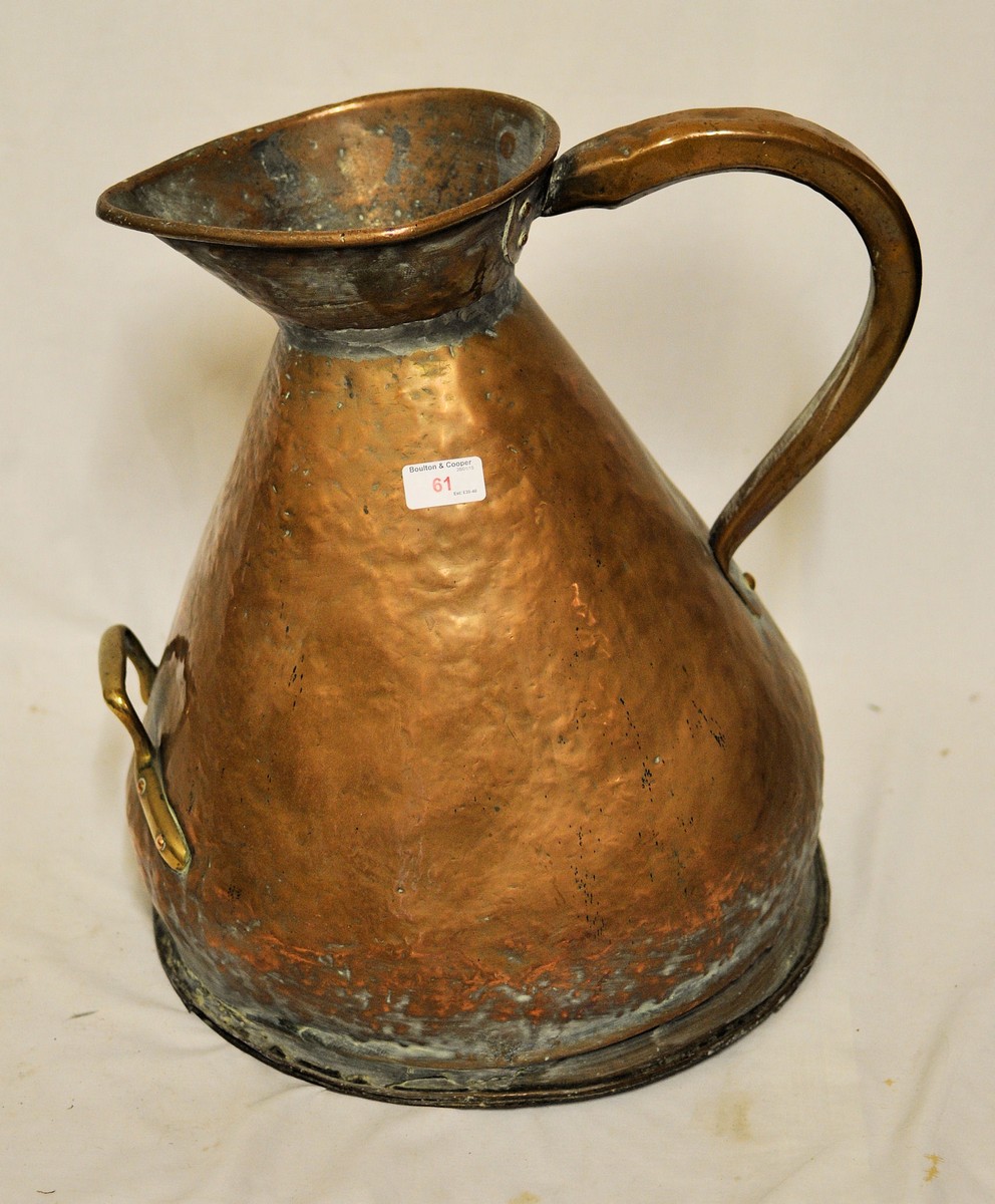 A large copper five gallon Measure.