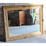 An antique design oblong Wall Mirror in a decorative moulded gilt frame. 3' 3" (100cms) x 4' 2" (