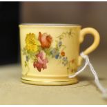 A Royal Worcester miniature Cup painted with sprays of flowers on a blush ivory ground, date code