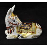 A Royal Crown Derby Donkey Paperweight with gold stopper, boxed.