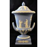 A Wedgwood Blue Jasper two handled Campana shape Vase and Cover decorated with classical figures and