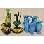 Six blue pressed glass Vases with various designs and six green overlaid glass items.