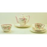 A Royal Doulton Sheila pattern Teaset decorated with floral sprays, comprising 12 cups and