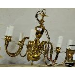 A similar smaller eight light brass Electrolier.